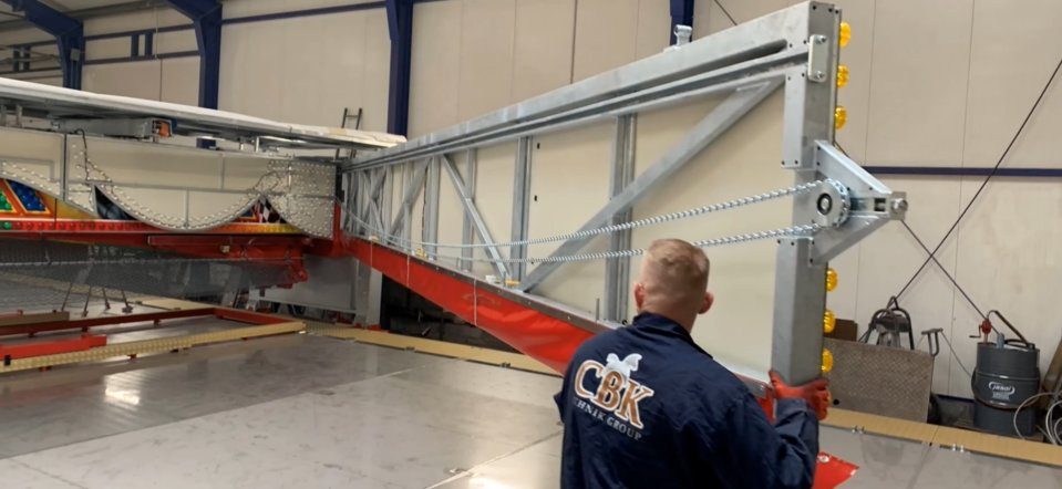 CBK technician assembling the ride structure on site